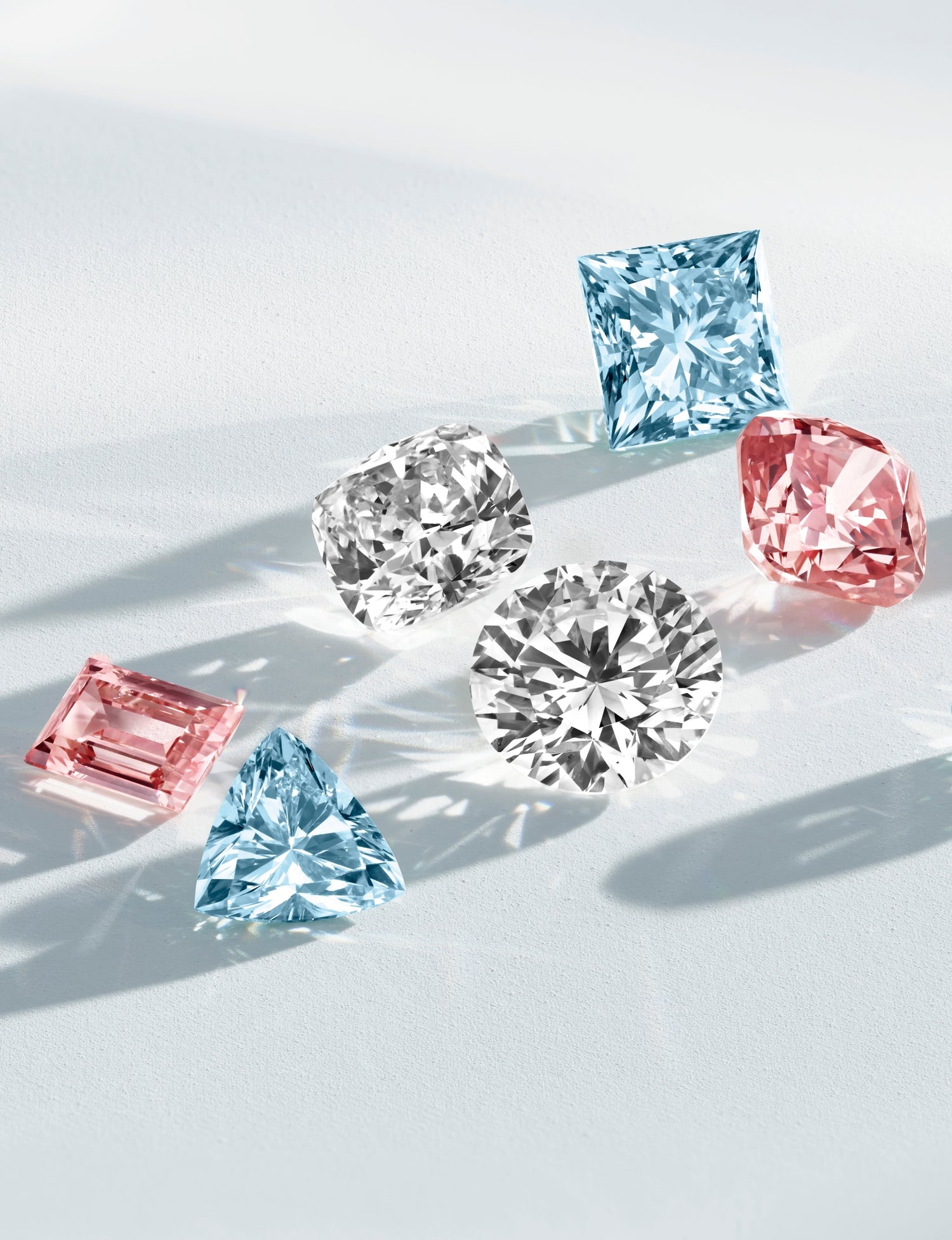 Lab-grown diamond pink, blue and white loose stones in various cuts
