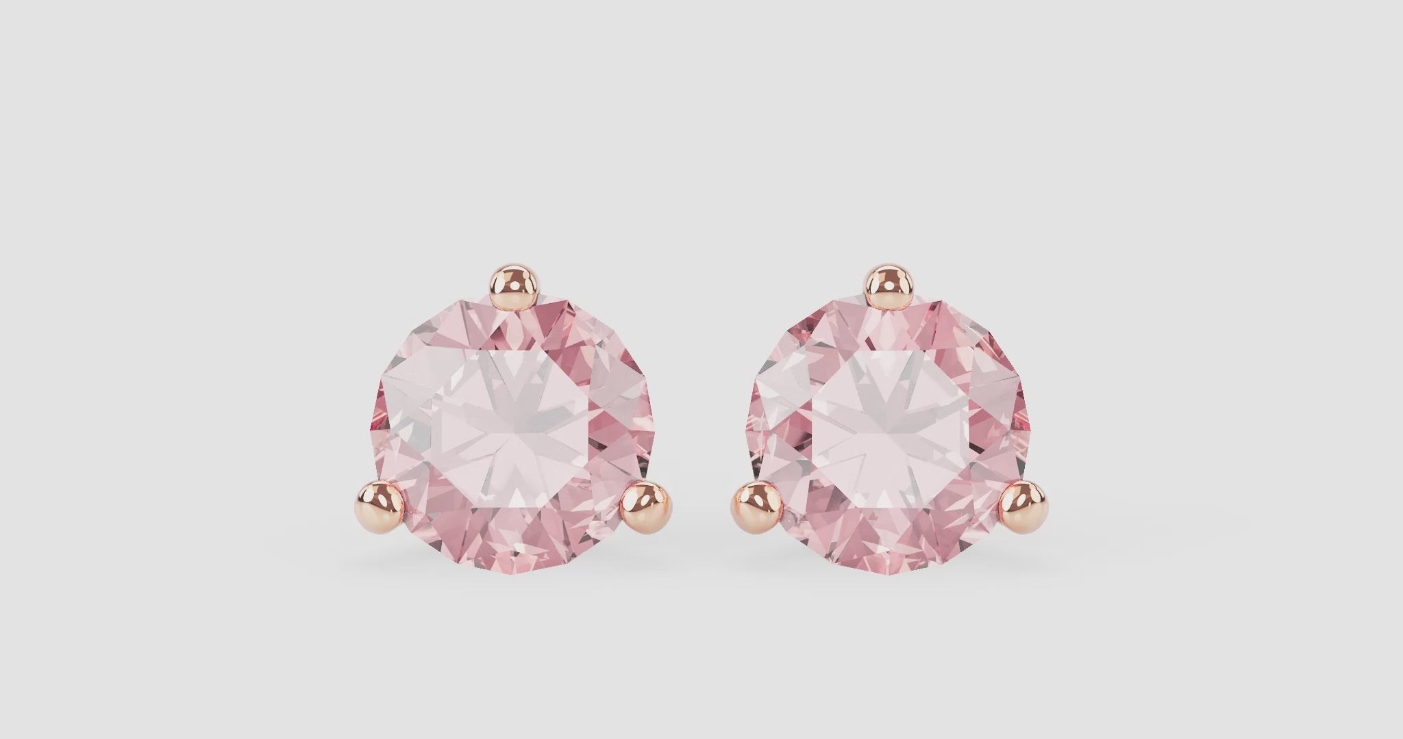 360 video of 1.5 carat total weight pink round brilliant studs