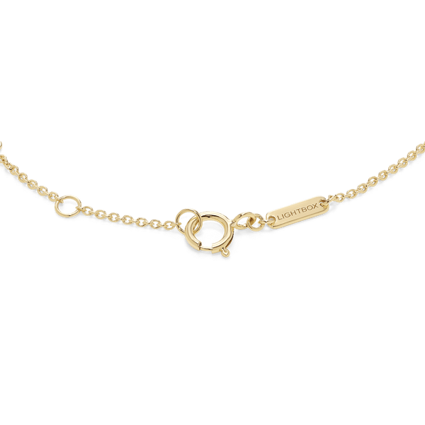 Closed clasp image of yellow gold mini bracelet