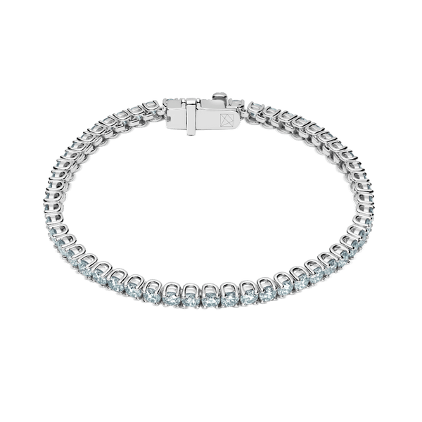 Overhead view of 5.25 carat, blue tennis bracelet in white gold