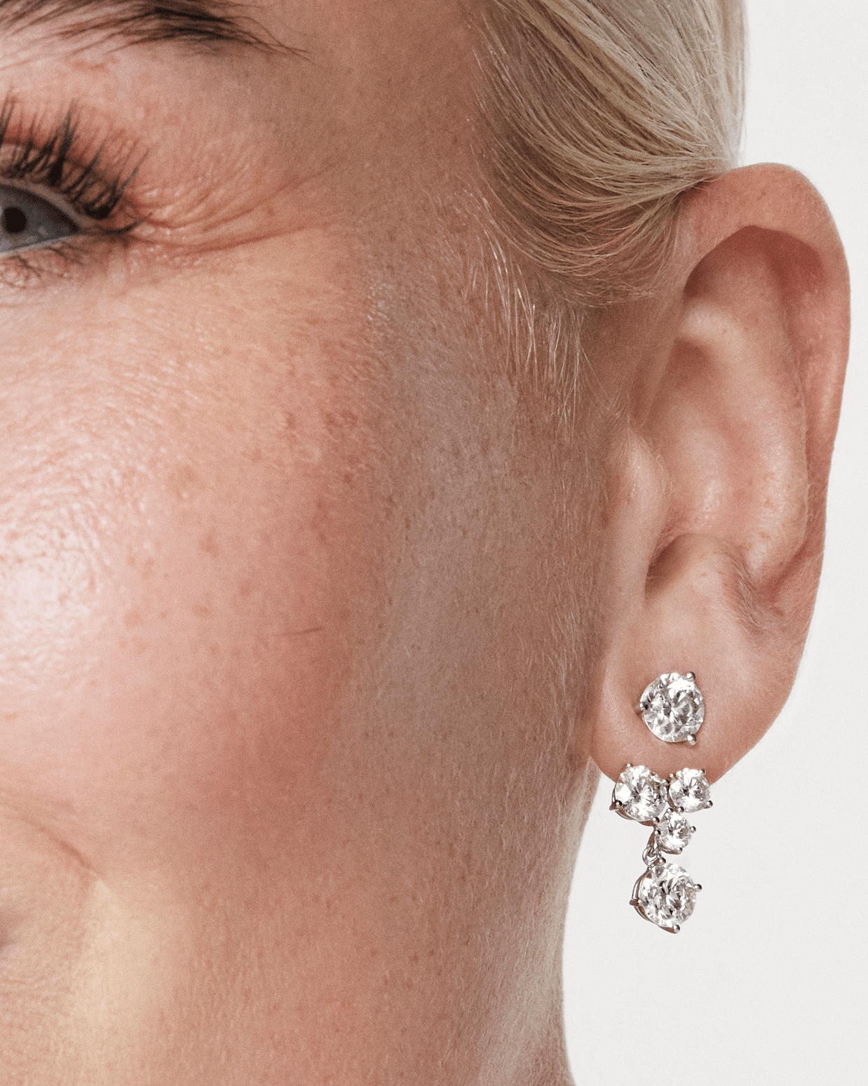 The Round Brilliant Solitaire Cluster Ear Jacket