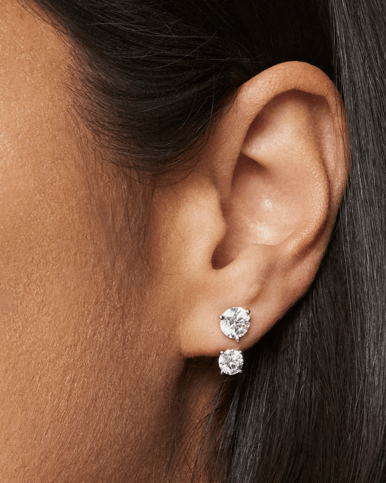 Model image of white gold, 1 carat total weight round brilliant ear jacket earrings 