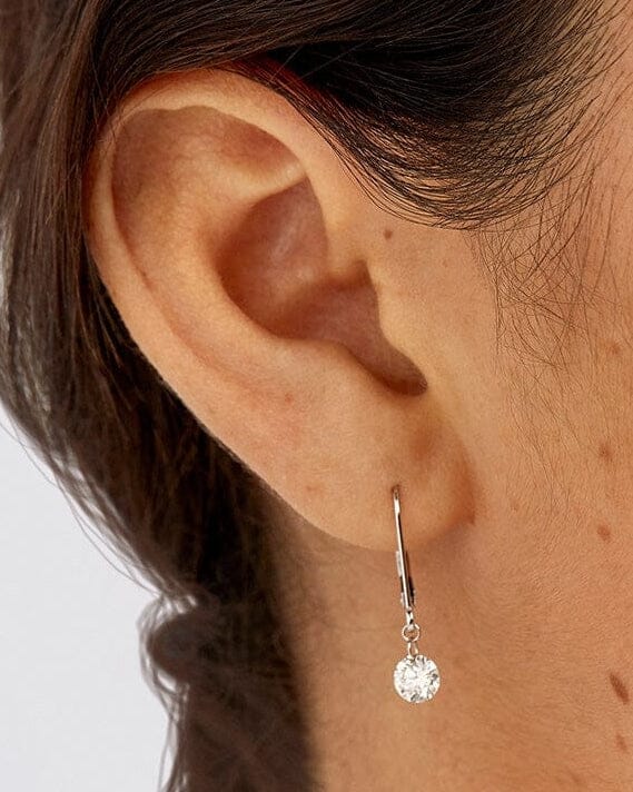 The Pierced Solitaire Drop Earrings