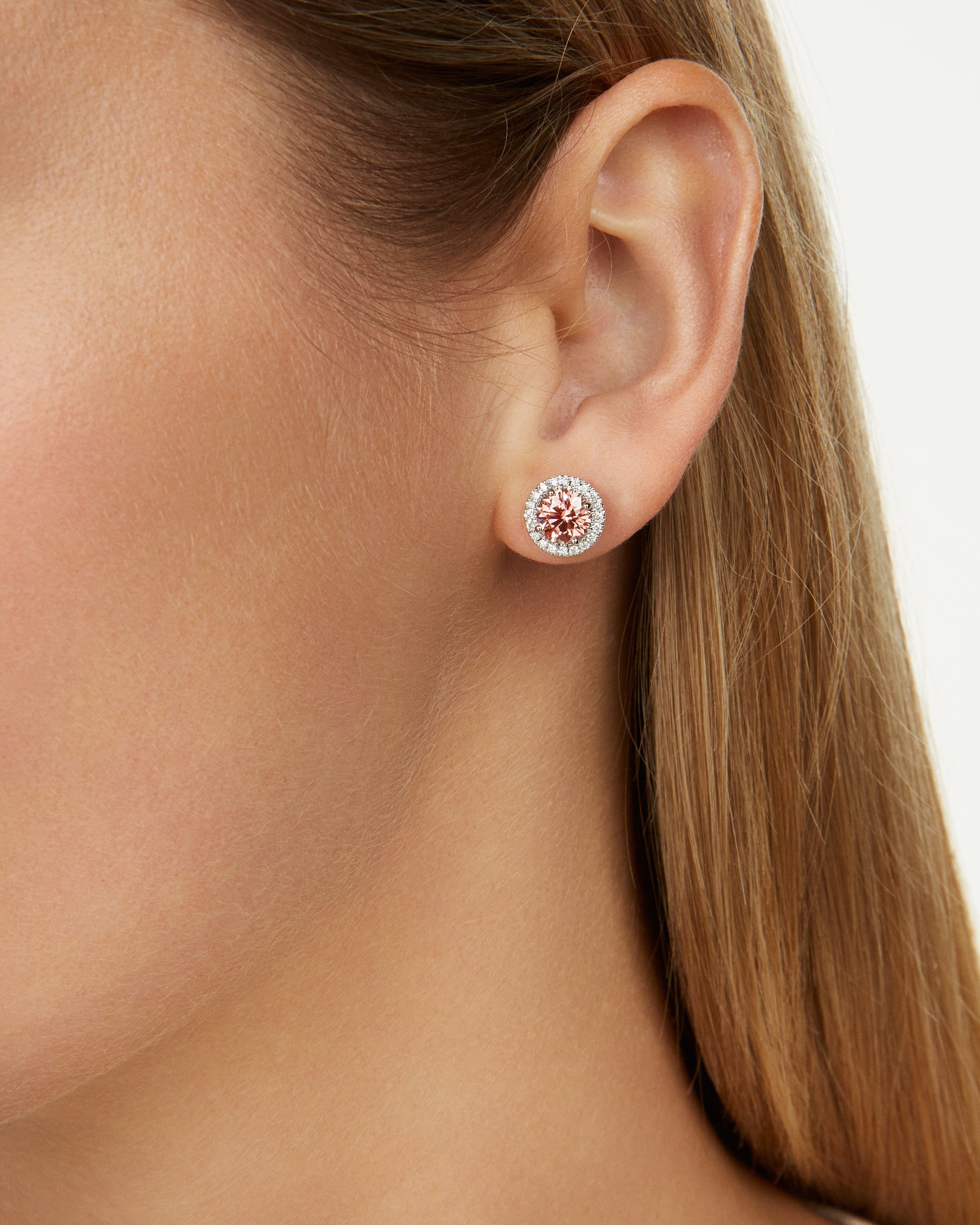 Model image of pink 2 carat total weight round brilliant halo studs