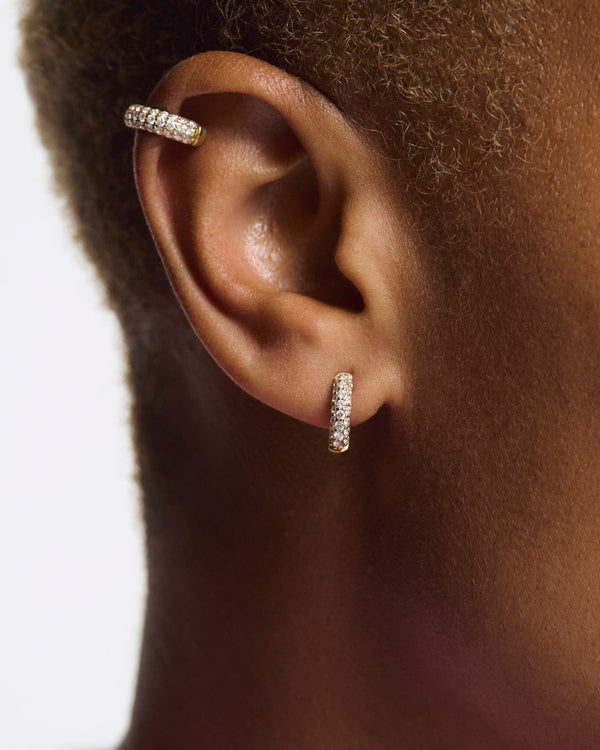 Model image of the yellow gold pave bubble hoops with the pave double ear cuff