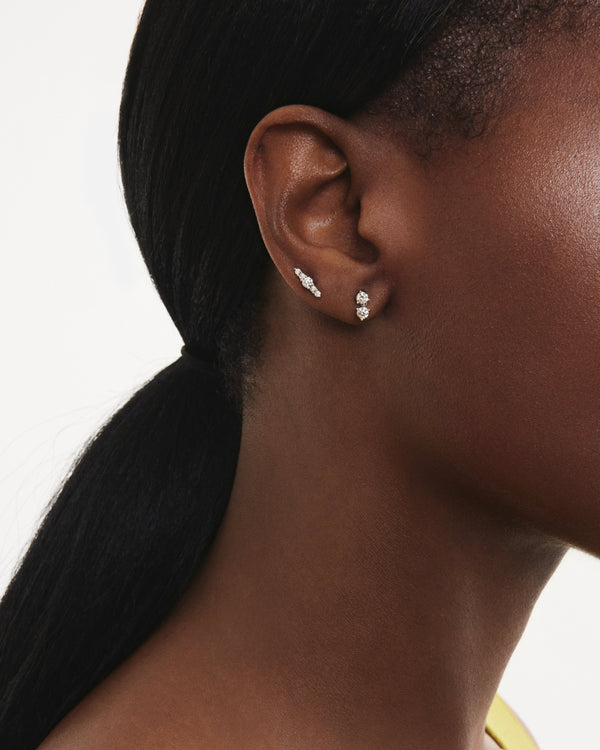 Model view of the mini double drop earring and the mini line earring in white gold