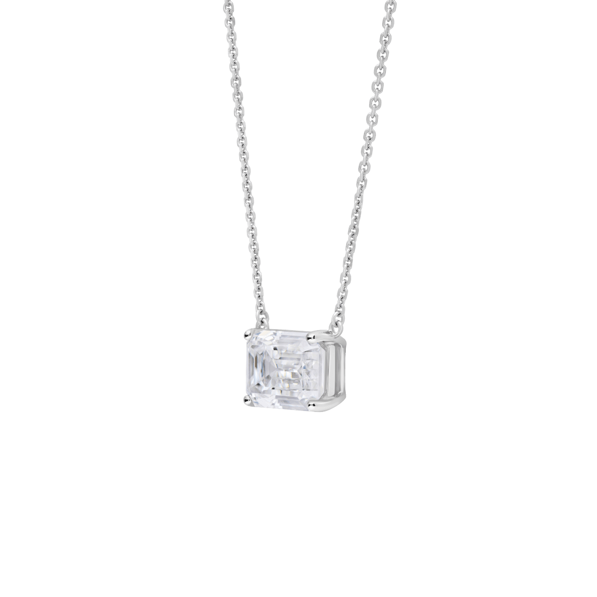 Side view of a 2 carat emerald cut pendant in white gold