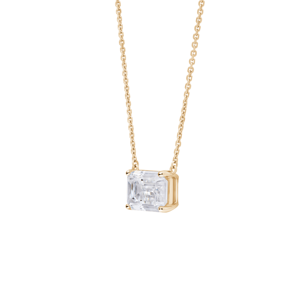 Side view of a 2 carat emerald cut pendant in yellow gold