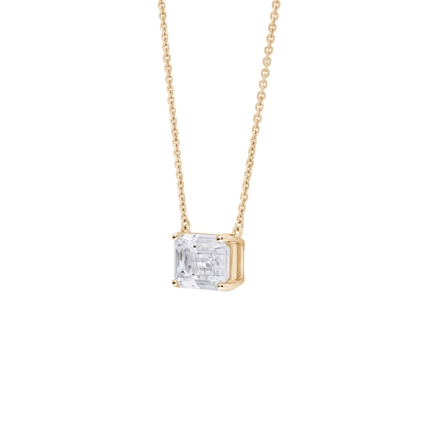 Side view of a 2 carat emerald cut pendant in yellow gold