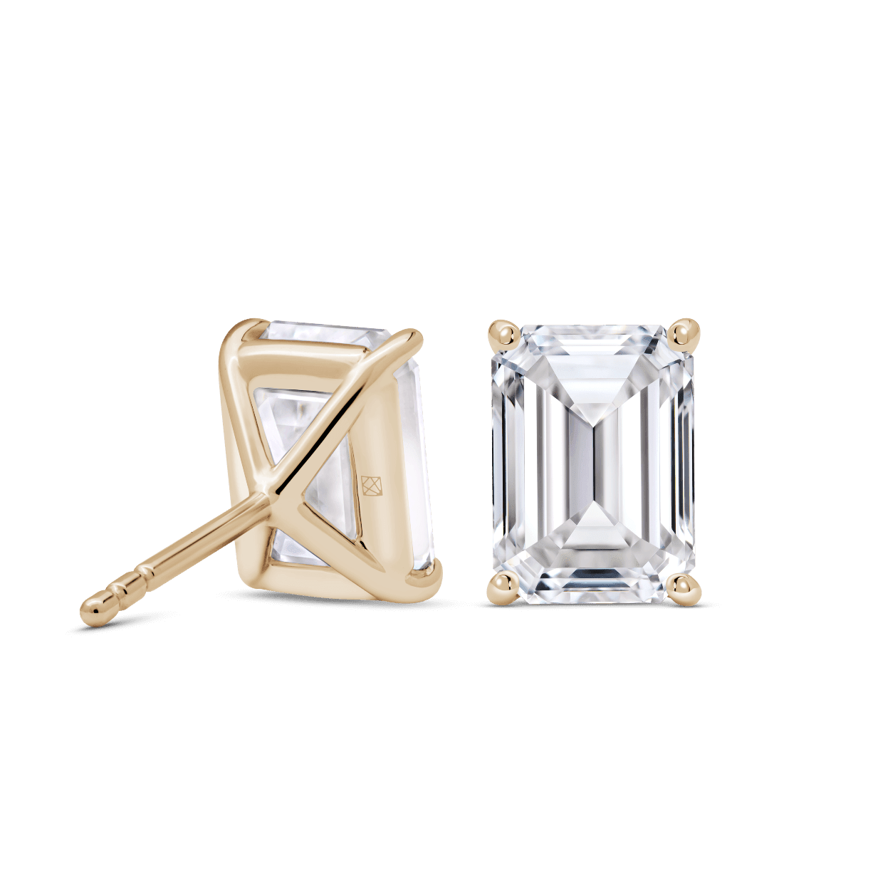 Back view of 4 carat total weight, emerald cut solitaire studs in yellow gold