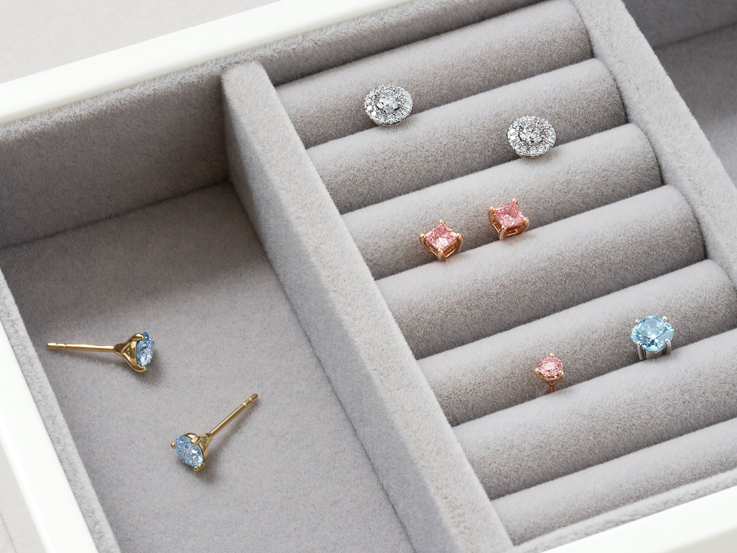 Lightbox lab-grown diamond studs stored in a jewelry box