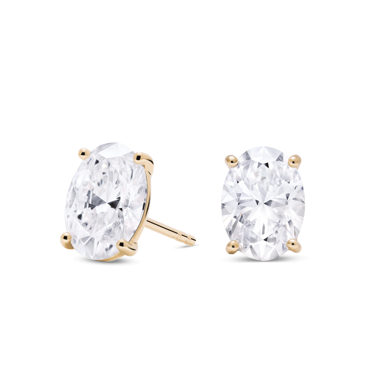 Side view of 2 carat total weight, oval cut solitaire studs in yellow gold