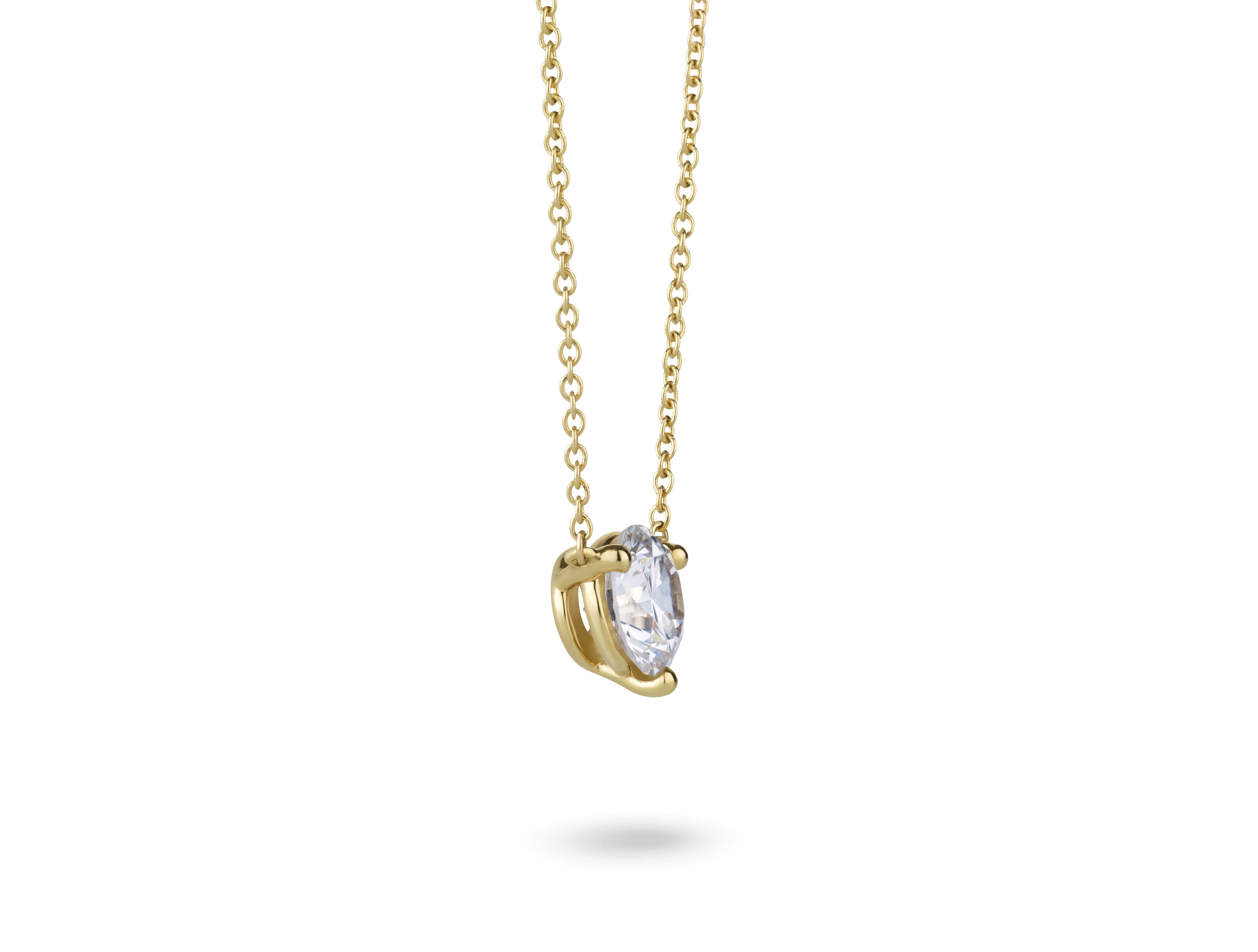 Side view of 1 carat round brilliant pendant in 10k yellow gold