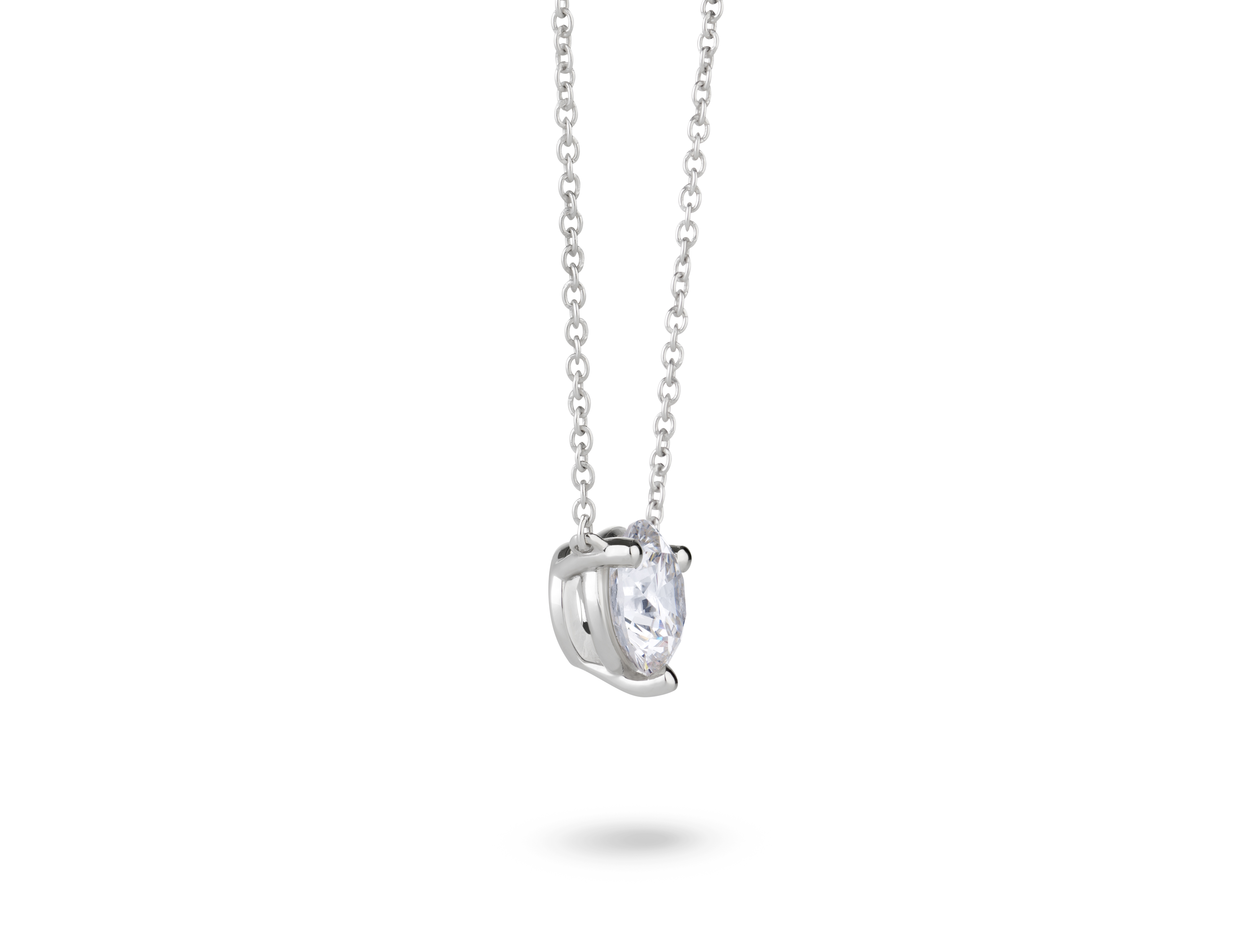 Side view of 1 carat round brilliant pendant in 10k white gold