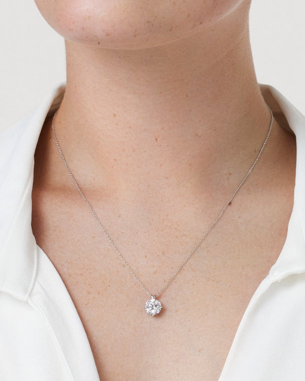 Model image of white gold, lab-grown 2 carat round brilliant bale pendant