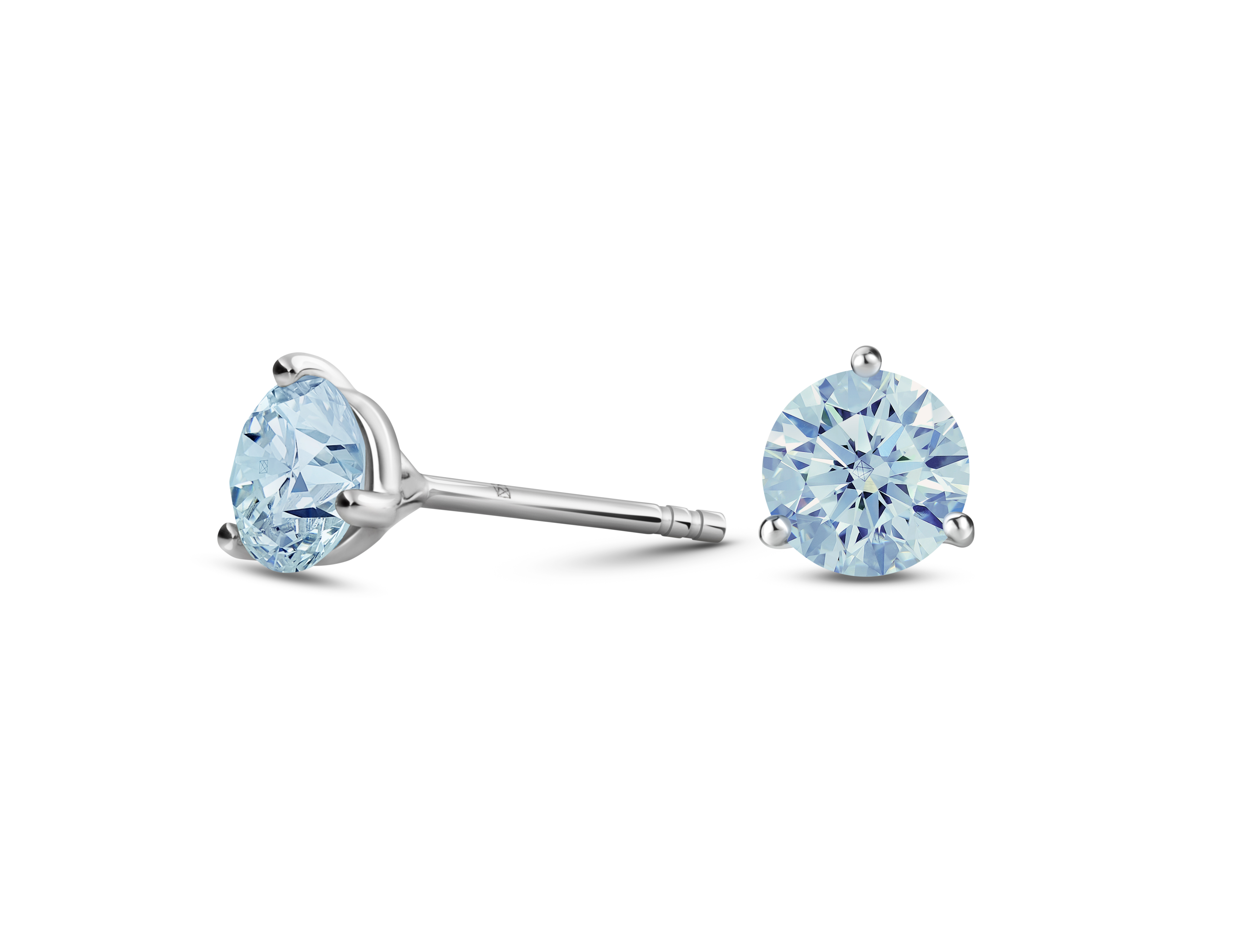 Side view of blue 1 carat solitaire studs in 14k white gold
